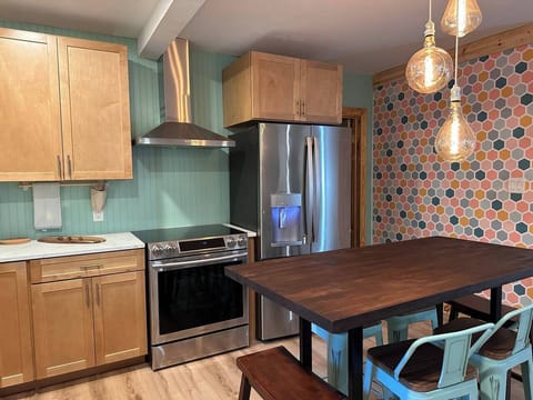 Kitchen is fun and well equipped. High end appliances