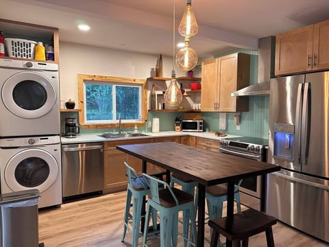 Another kitchen angle. FYI washer/dryer and dishwashers are all quiet energy efficient appliances.