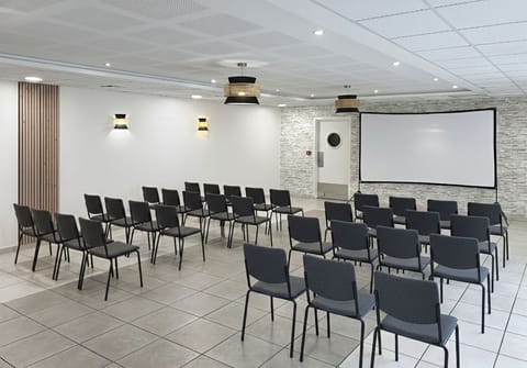 Conference room at the hotel, available for group bookings and business use.