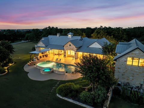 Dusk descends, and the lights come alive. A serene twilight scene at home.