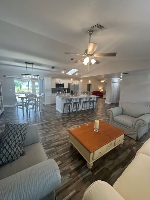 Open concept living room, kitchen, dining