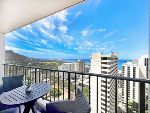 Relax and take in the distant, magnificent view of Diamond Head, the ocean, and the city from your private balcony.