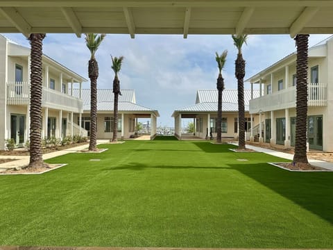 A peaceful courtyard at the heart of Pass Bungalows—perfect for morning coffee, afternoon games, or evening strolls.