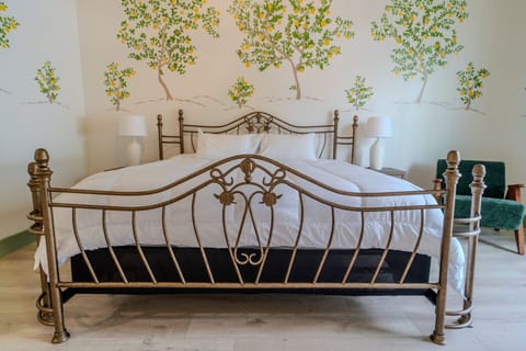 Thoughtfully designed king room with artisan touches and a warm, inviting feel