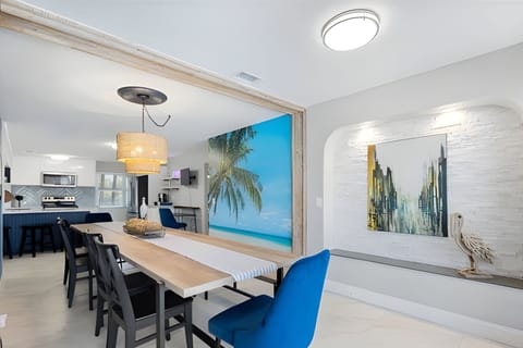 Open kitchen, dinning and living rooms makes for great conversation.