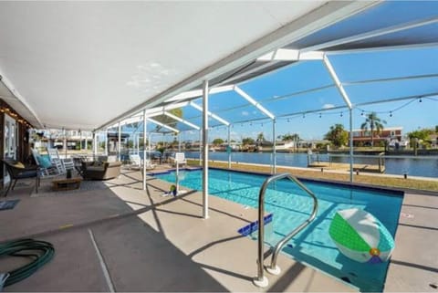 Private, heated pool on the water