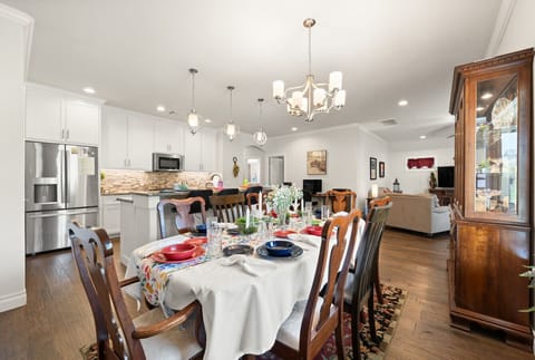 Elegant Dining Area| Formal Table, Seating & Warm Lighting
