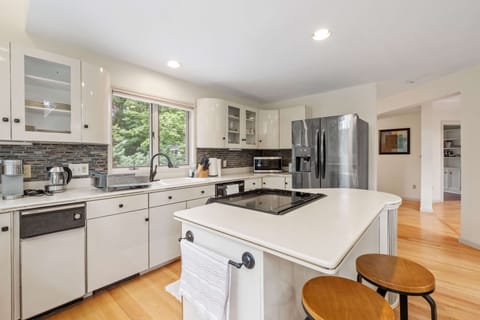 Large kitchen that will be stocked with all of your kitchen needs.