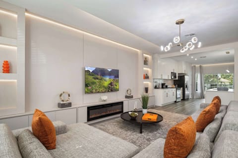 Contemporary open-plan living with style and light.