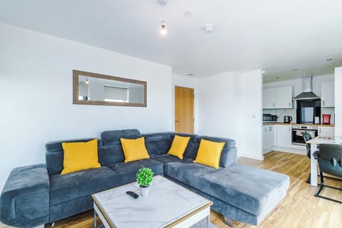 Spacious living room ideal for movie nights or catching up with family and friends.