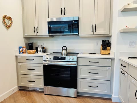 Electric range and microwave