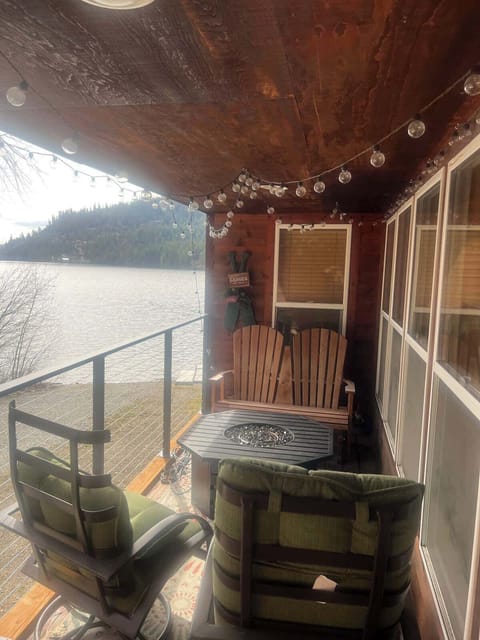 Side deck with seating for morning sun or afternoon shade.  Also a wonderful place to sit in the evening with tea lights.
