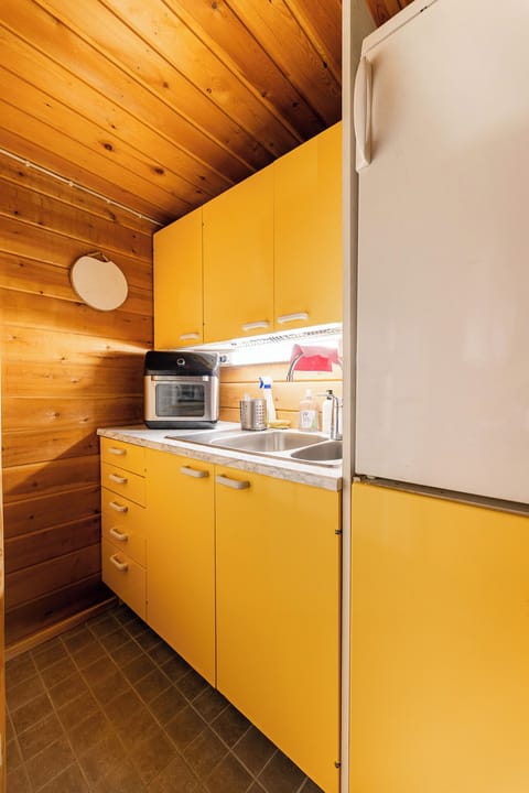 Kitchen Airfryer and running water.