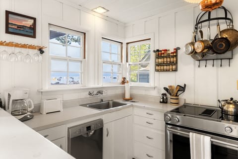 Enjoy a full kitchen with a beautiful view of the lake.