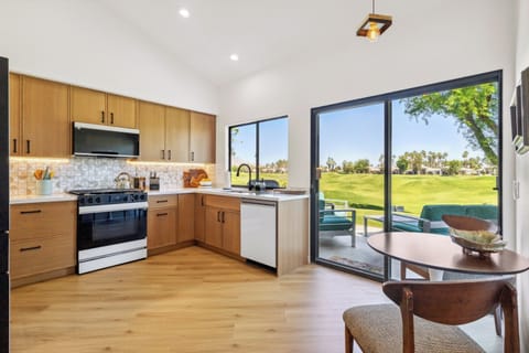 Cook like home in a fully equipped kitchen with modern appliances and ample counter space