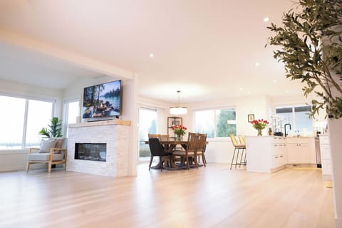 Spacious open-concept dining connecting the living room and kitchen