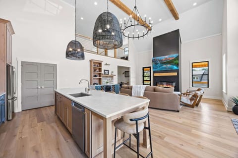 Kitchen: Cook up unforgettable memories in this stunning and well-equipped kitchen. The spacious island and modern appliances make it a joy to prepare meals together.