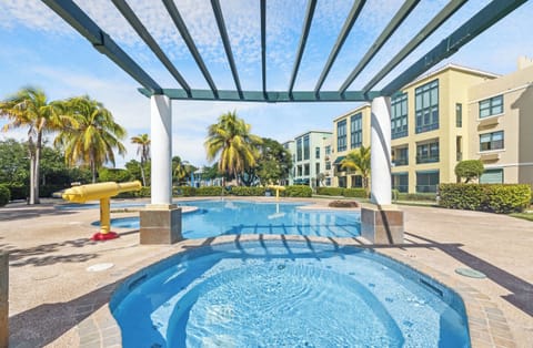 Lounge by the sparkling pool and cool off on a hot tropical day.