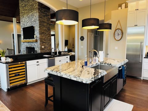 Main level kitchen with extra ice maker and wine cooler