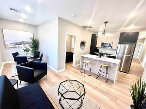 Brand new kitchen and appliances with breakfast bar, dishwasher ,microwave, refrigerator. 
Joined with the living room with futon sofa bed, large flat screen tv , fireplace and dining room. 