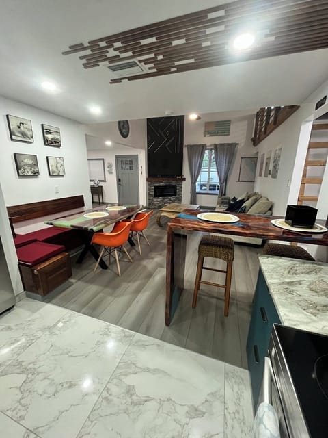 Bright, spacious design with unobstructed views from kitchen to living room.