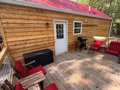 grilling deck with table between.