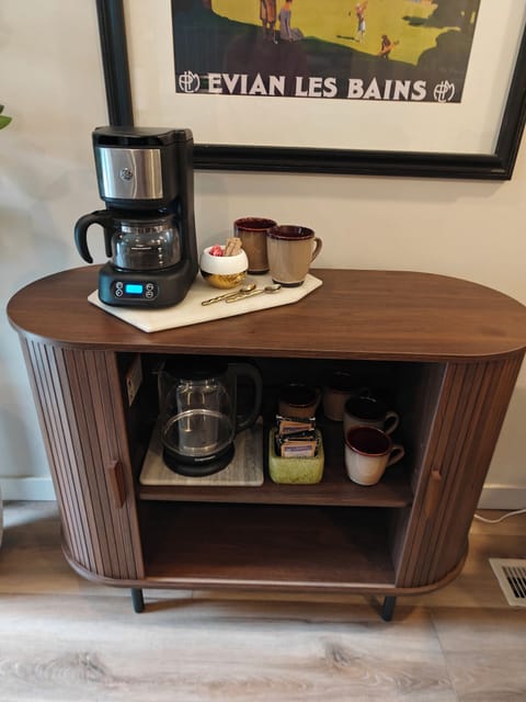 Complimentary organic coffee and tea station, complete with sugars and creamers
