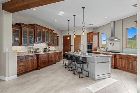 High-end appliances and a massive island ready for your culinary creations.