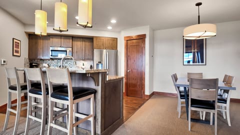 Spacious kitchen and dining area with modern rustic design