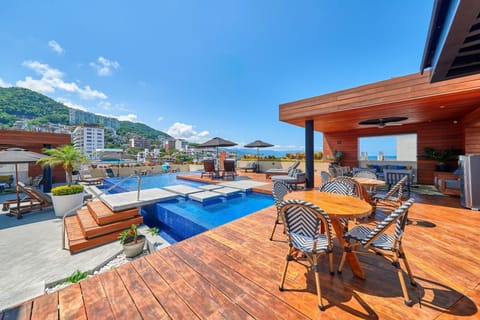 Relax with stunning views from the rooftop pool at Pavilion