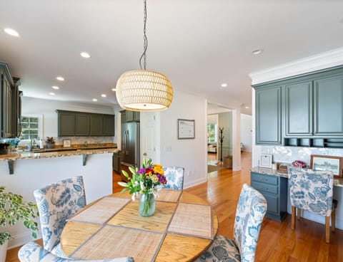 Kitchen area with work space, and additional table seating