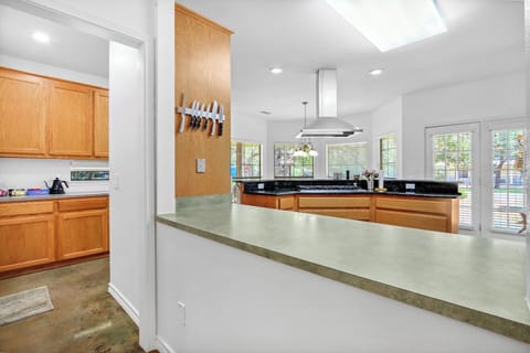 Window between living/dining area and kitchen