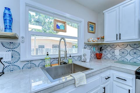 Enjoy easily to use appliances such as a garbage disposal, microwave, dishwasher, fridge, oven range and small wine fridge