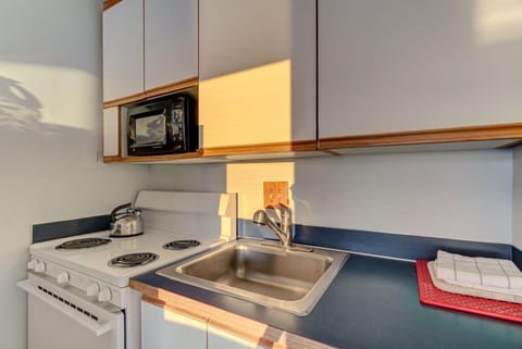 This nook has essential appliances for easy meal preparation during your stay.