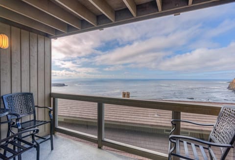 The ocean-view balcony provides a serene outdoor space with comfortable seating, ideal for savoring morning coffee or watching the sunset over the water.