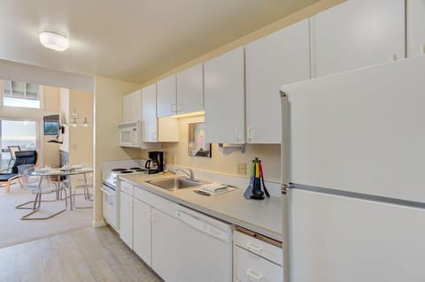 The full kitchen is equipped with modern appliances, providing the convenience of home-cooked meals while enjoying your stay at the inn.