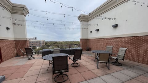 Enjoy open-air seating and skyline views from the Gateway Village rooftop — your peaceful retreat in Murfreesboro.