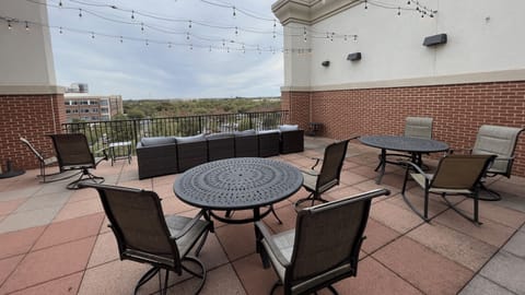 Enjoy open-air seating and skyline views from the Gateway Village rooftop — your peaceful retreat in Murfreesboro.