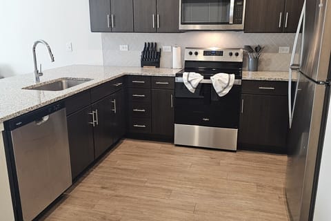 Bright and modern kitchen designed with convenience and comfort in mind.