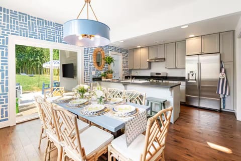 Elegant dining for 8, 4 at the counter, additional dining in lovely backyard.