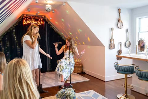 2 mic karaoke, disco balls, LED lights, props, custom WAHOOWA sign, ENJOY!