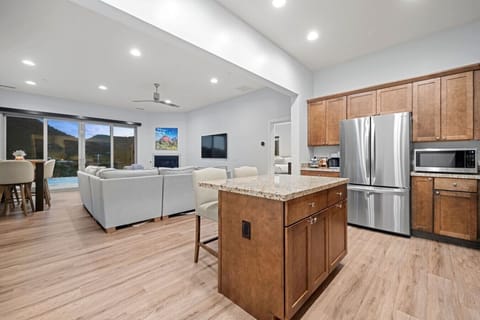 Open concept kitchen that flows beautifully into the living space