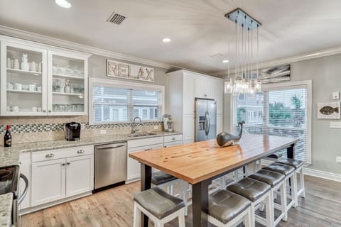 Kitchen & dining: Drip coffee maker, Keurig, Crockpot, air fryer, blender, cooking utensils, tableware, seating for 10