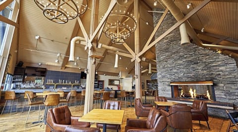 Relax fireside in a soaring lounge made for après-ski chats.