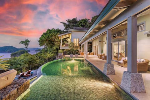 Experience crimson vistas from your exclusive Pacific sanctuary.

