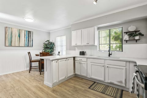 Gather in the spacious kitchen, complete with seating for six
