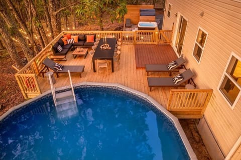 Soak up sun by the private pool surrounded by a spacious deck & lounge seating