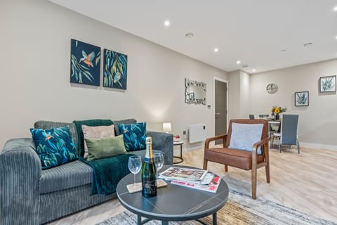 Relax in the living room after a long day exploring Birmingham. There is a comfy sofa and a sleek armchair for you to rest on whilst you enjoy the SMART TV with Netflix, iPlayer and more!