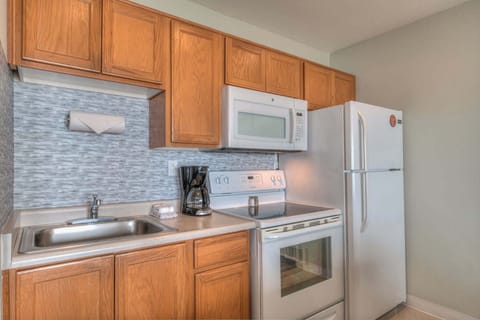 The unit has a full kitchen with everything you need to prep meals