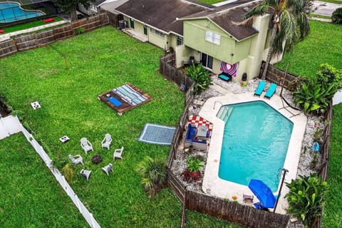 Oversized yard and sunbathing deck in private fenced yard with fire pit.